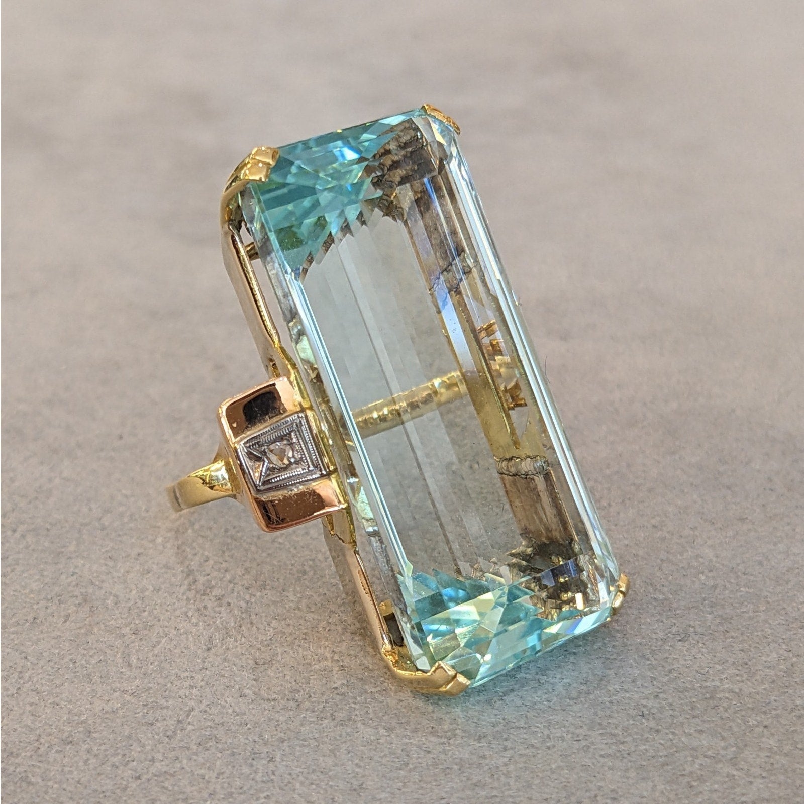 66.92 ct Elongated Aquamarine in Retro ring setting 18k and 14k Gold