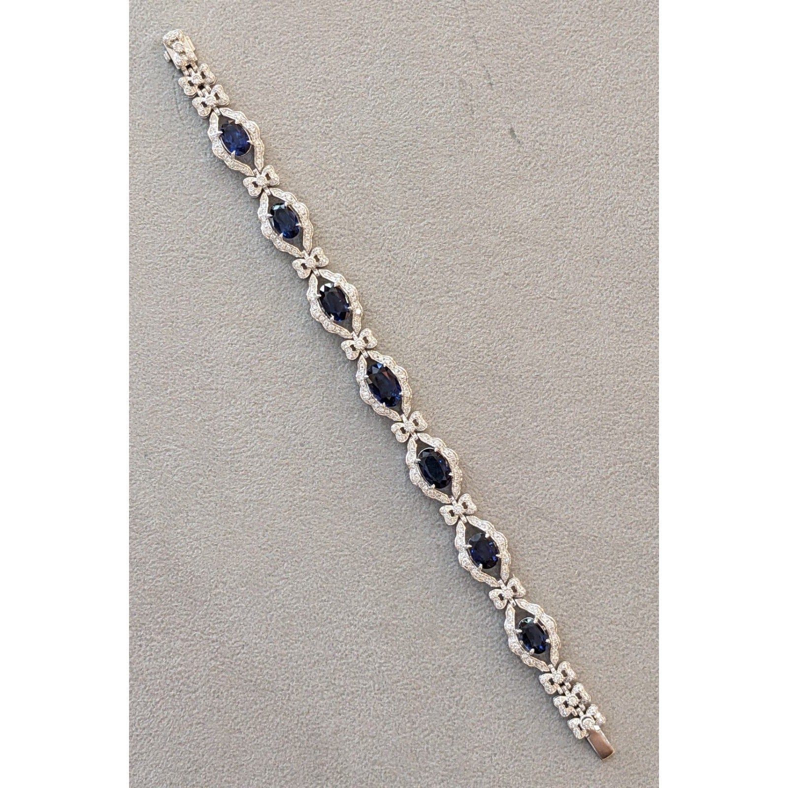 Blue Sapphire and Diamond Station Bracelet with Bows in Platinum